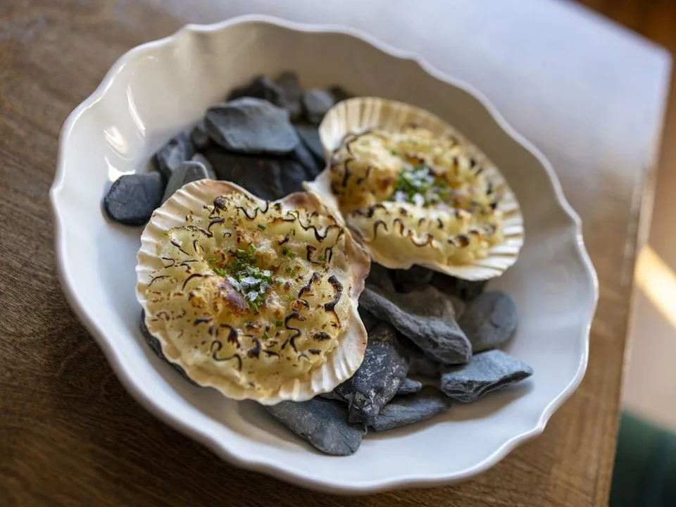 Baked bay scallops with truffle pomme purée — Le Charme French bistro Calgary